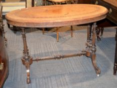 A Victorian burr walnut and parquetry inlaid oval centre table, 110cm wide