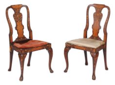 A pair of Dutch walnut and marquetry inlaid side chairs