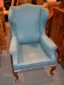 A mahogany and blue upholstered armchair, late 19th/early 20th century