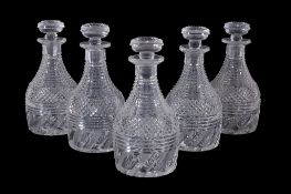A set of five Regency-style cut-glass mallet-shaped decanters and stoppers