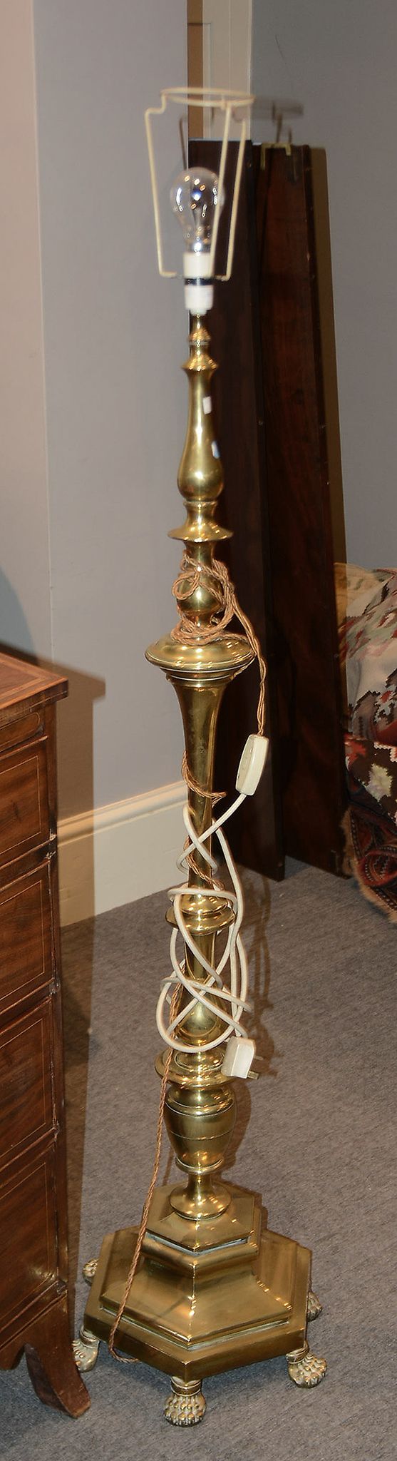 A brass baluster stem standard lamp, 20th century