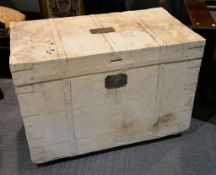 A white painted trunk, with label for TFS FLEMMING R.N