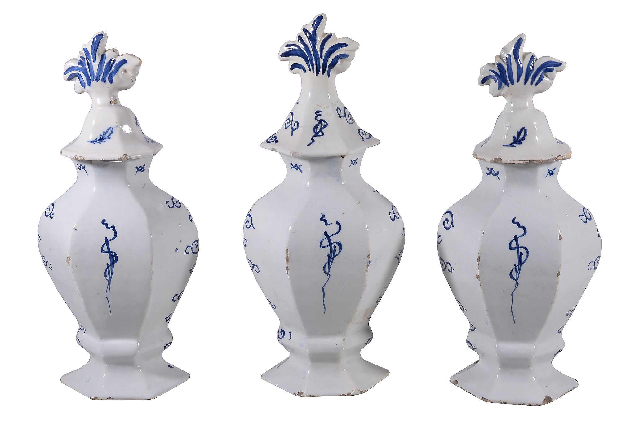 A garniture of three Dutch Delft blue and white hexagonal section vases and... A garniture of - Image 2 of 2