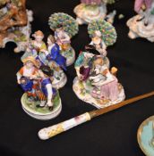 A pair of German porcelain small figures in Derby style