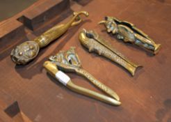 A collection of 19th century and later brass and steel nutcrackers