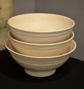Three Wedgwood Moonstone glazed porcelain bowls, by Keith Murray