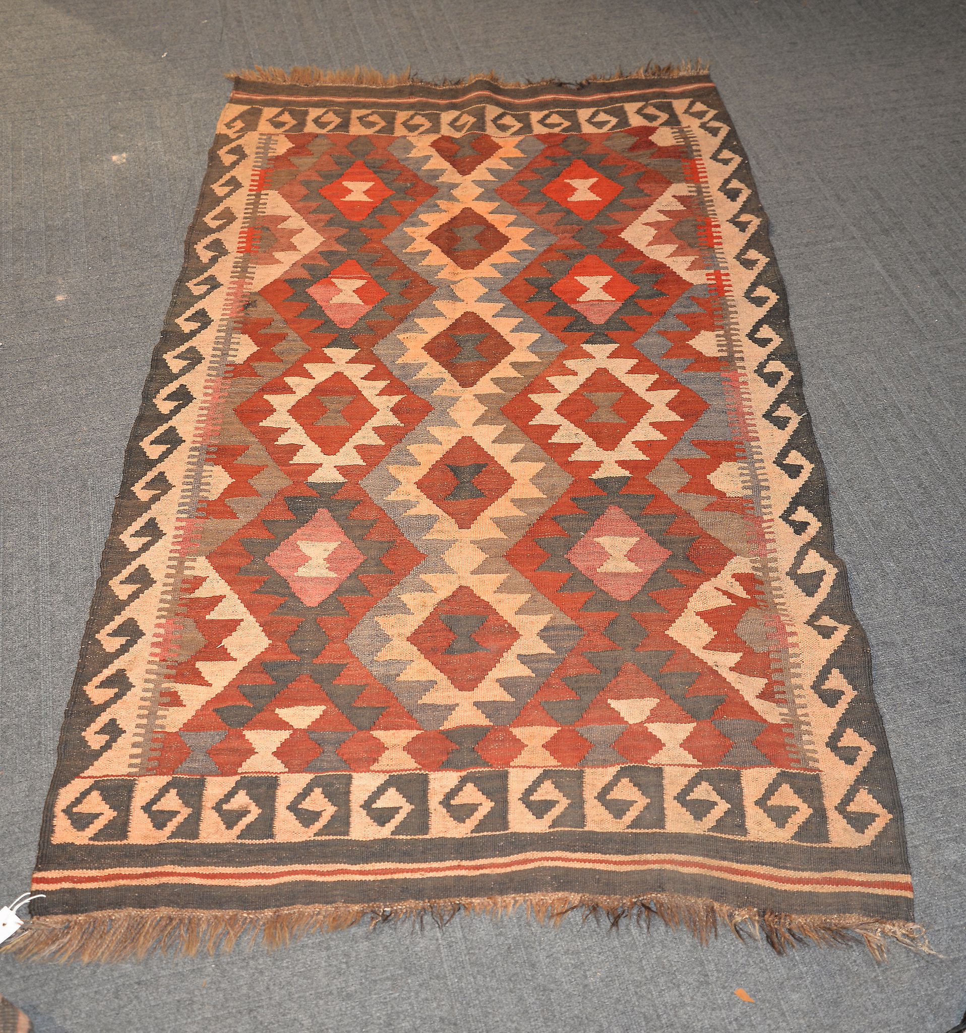 Four similar Kilim style rugs, various sizes