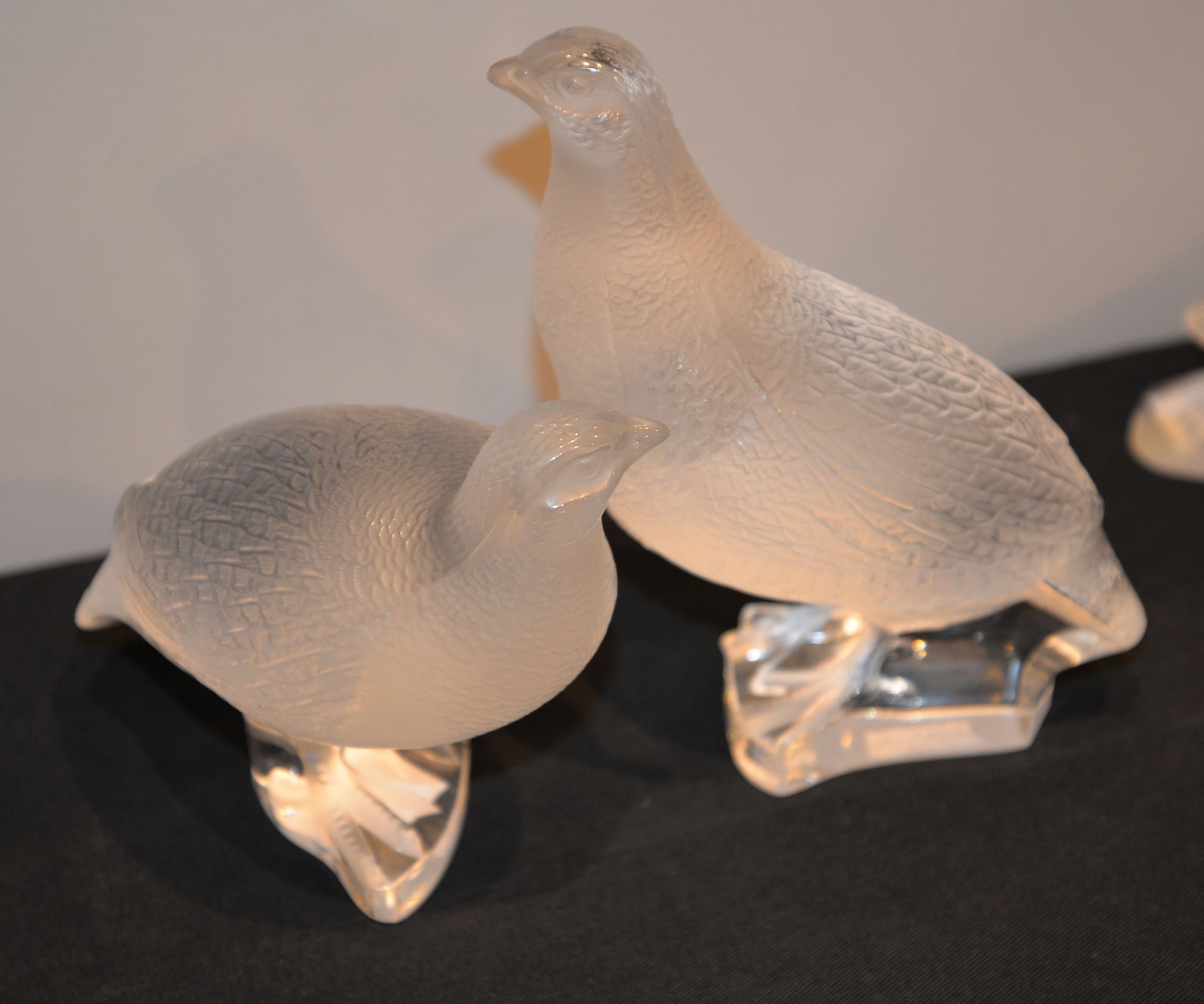 A pair of modern Lalique frosted glass models of partridge, etched marks