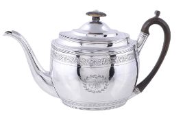 A George III silver oval tea pot by Thomas Wallis II, London 1804, with a stained ivory finial, a