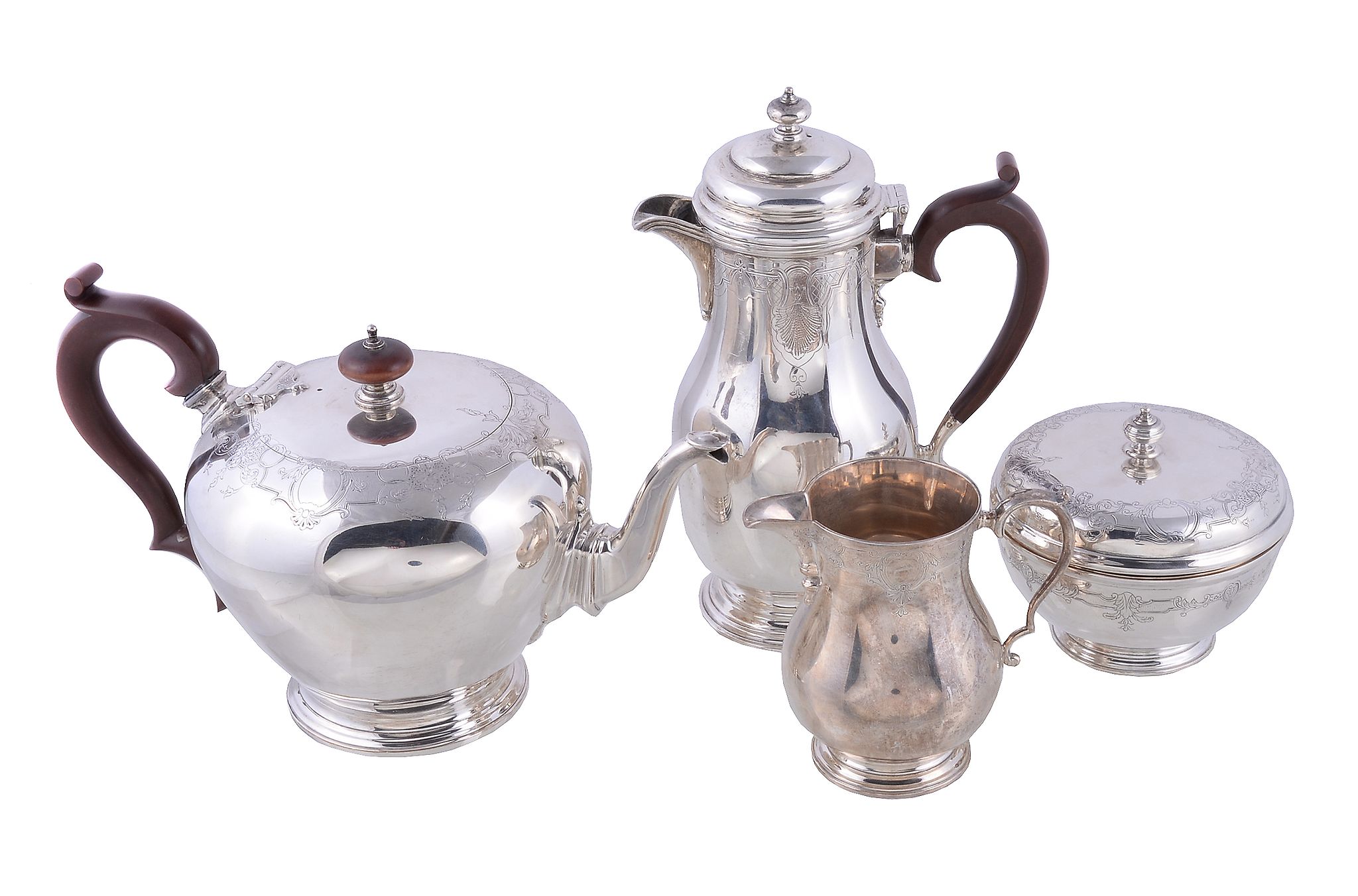 A silver three piece circular tea service by The Goldsmiths & Silversmiths Co. Ltd., London 1927,