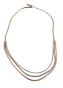 A gold coloured necklace, the three colour necklace composed of snake links, with a brushed finish