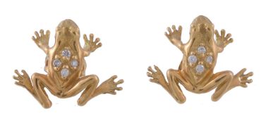 A pair of diamond frog ear studs, each set with four brilliant cut diamonds to their backs,