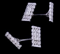 A pair of diamond set cufflinks, the rectangular ropetwist panels set with brilliant cut diamonds,