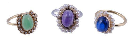 An amethyst and seed pearl ring, the oval cabochon amethyst within a seed pearl surround, finger