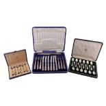 A collection of small flatware and cutlery, including: a set of twelve coffee spoons by Mappin &