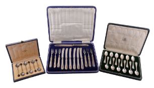 A collection of small flatware and cutlery, including: a set of twelve coffee spoons by Mappin &