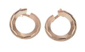 A pair of gold coloured earrings, the spiralling hoops with reeded detail, with post fittings, 2.