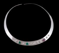 A gold coloured multi gem set collar, the polished choker with applied brilliant cut diamond and