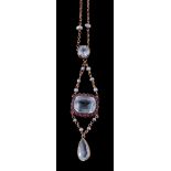 An aquamarine, ruby and seed pearl necklace, the rectangular cut aquamarine claw set within a