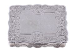 A Victorian silver shaped rectangular vinaigrette by George Unite, Birmingham 1865, the cover