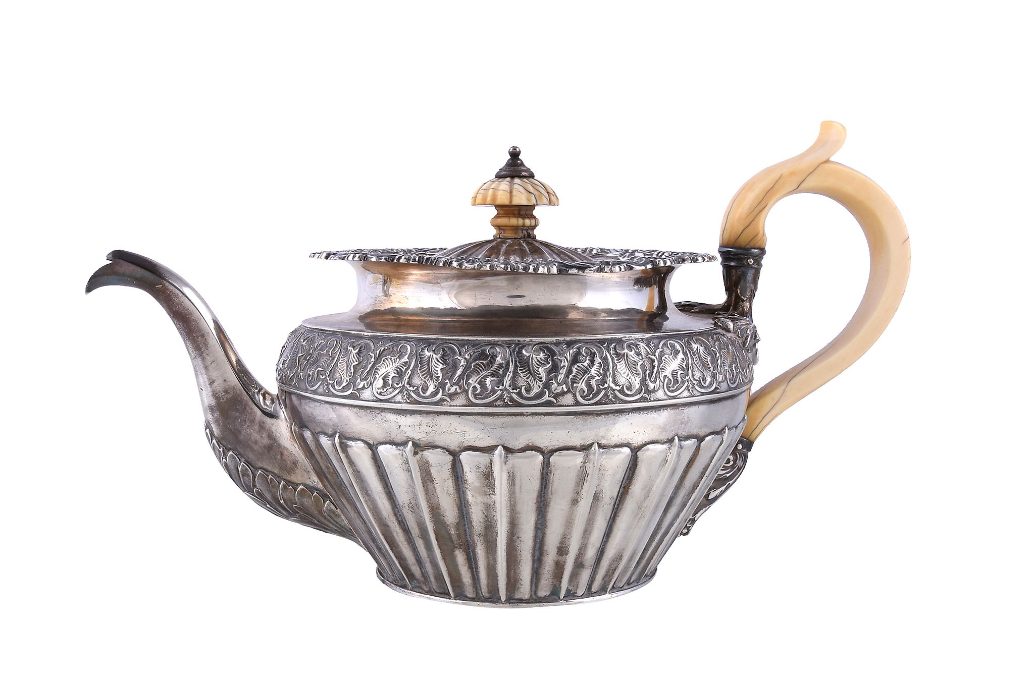 A George IV silver circular baluster tea pot, maker's mark obscured, London 1824, with an ivory