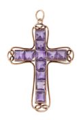 An amethyst cross pendant, set with square cut amethysts, 6cm long