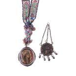 A Spanish or Spanish colonial oval double sided devotional pendant, inset with a full length