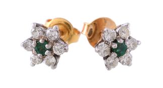 A pair of emerald and diamond cluster earrings, the central circular cut emerald within a surround