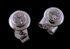 A pair of diamond ear studs, the brilliant cut diamonds, approximately 0.26 carats total, with post