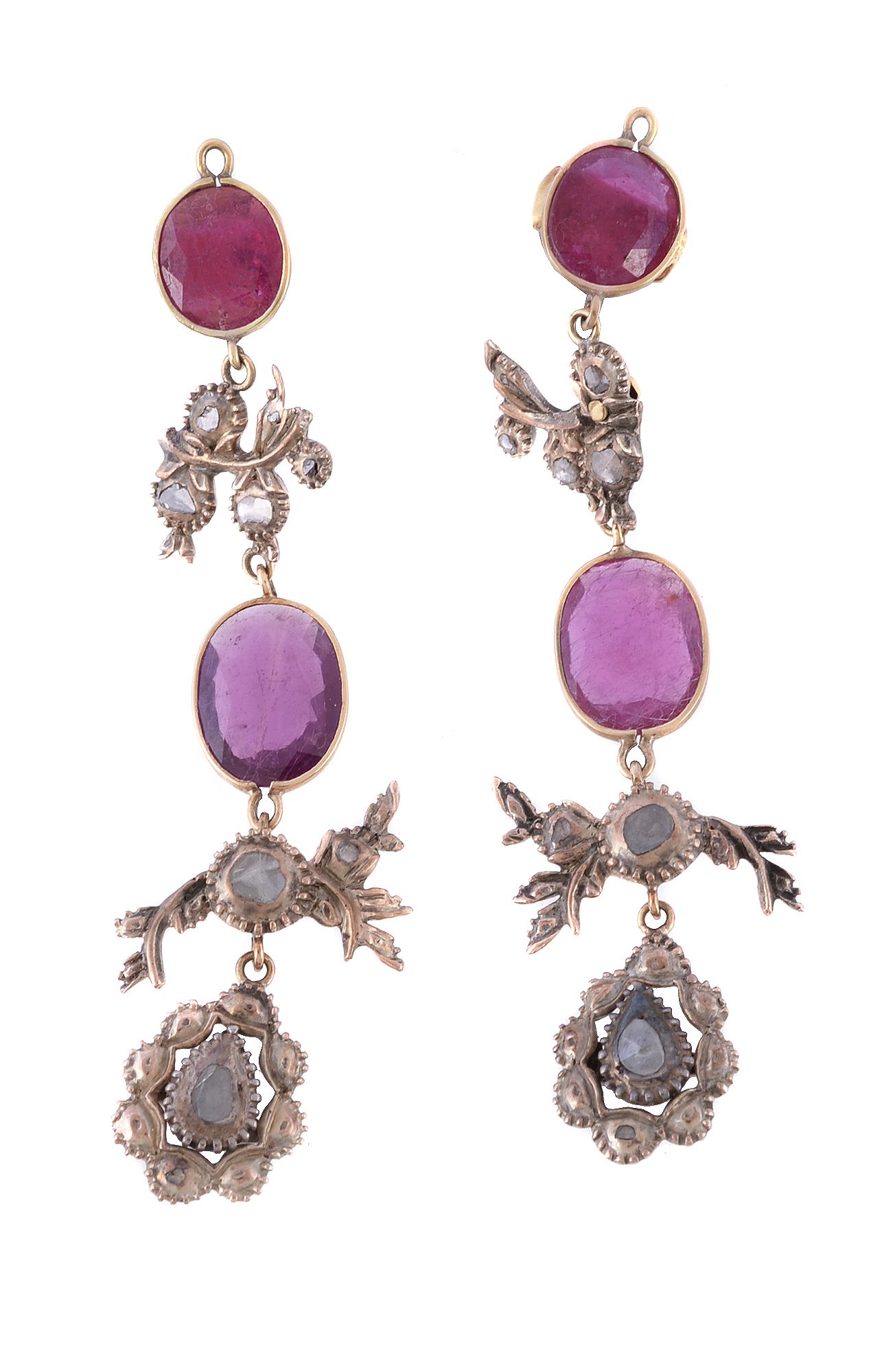 A pair of red stone and diamond earrings, the oval cut red stones between panels set with lasque