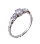 A diamond ring, the central brilliant cut diamond, estimated to weigh 0.16 carats approximately,