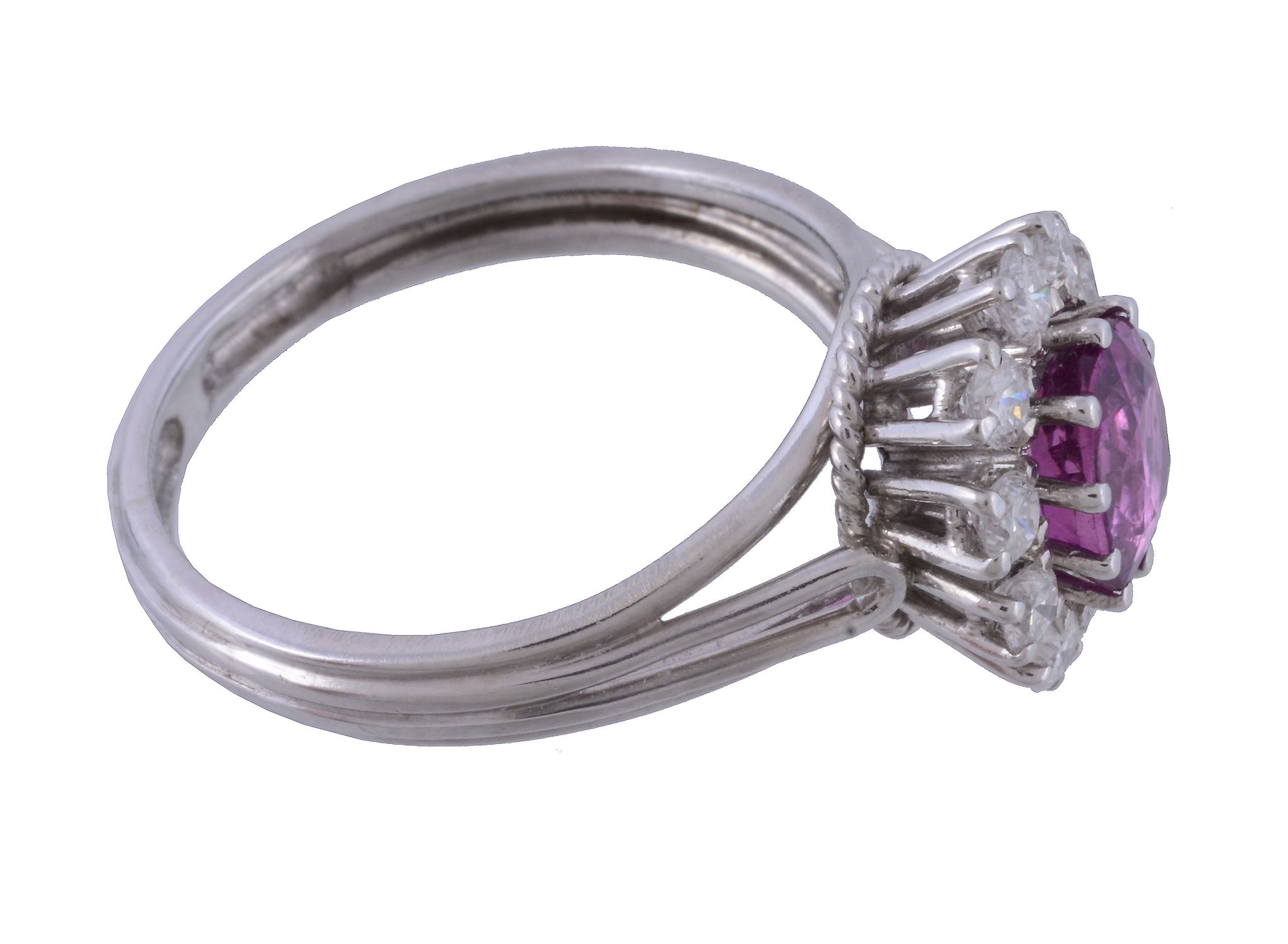 A 1970s pink sapphire and diamond cluster ring, the central oval cut pink sapphire claw set within - Image 2 of 3