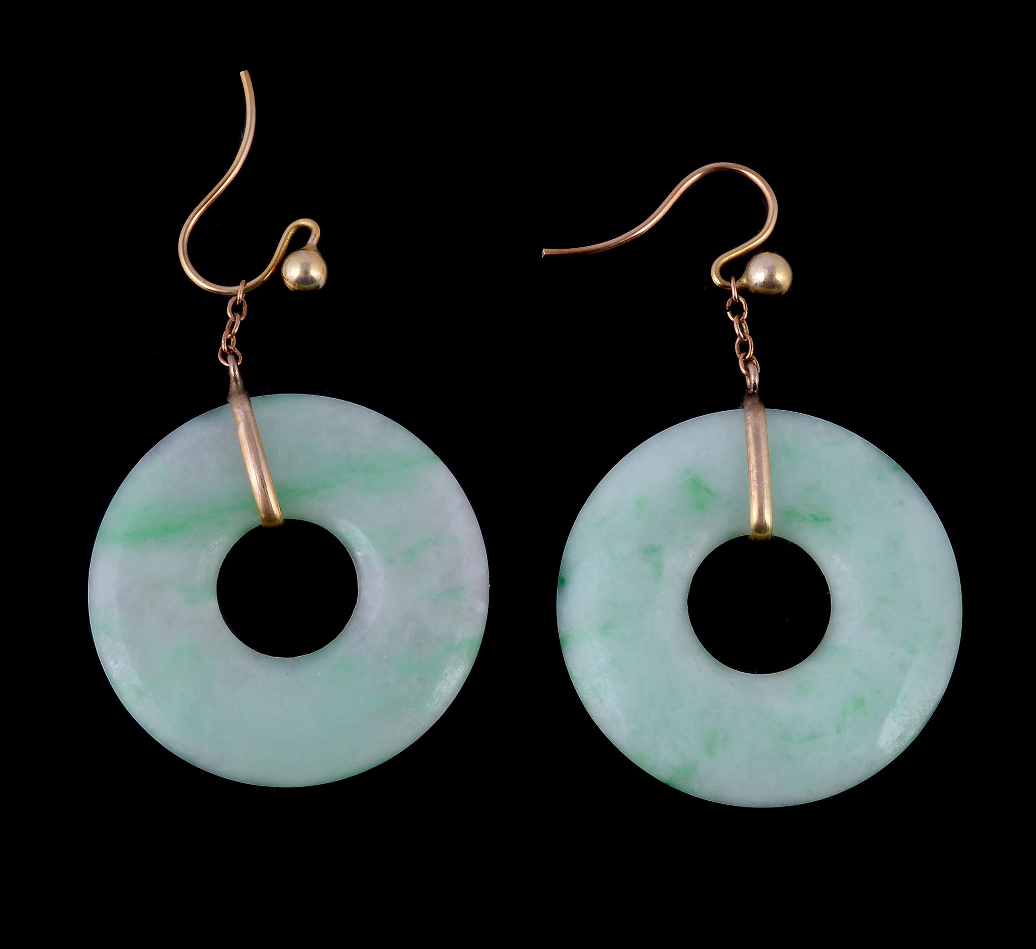A pair of jadeite jade hoop earrings, the circular jadeite jade with shepherd's hook fittings, 4.