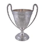 A silver twin handled pedestal cup by West & Son of Dublin, London 1911, with ribbon bound reeded