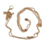 A gold coloured long chain, composed of belcher links, 170cm long, 33.6g