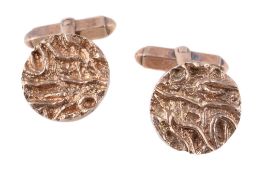 A pair of 9 carat gold cufflinks by Kurt Weiss, the circular textured panels with t-bar fittings,