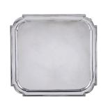 A silver shaped square salver by Thomas Bradbury & Sons Ltd, London 1928, with curved inset angles,