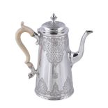 A Victorian silver straight-tapered coffee pot by Elkington & Co., Birmingham 1872, in George II