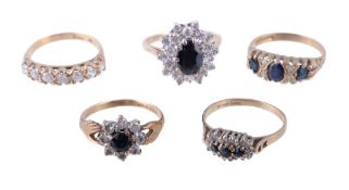 A 9 carat gold sapphire and diamond ring, the three oval cut sapphires claw set between brilliant