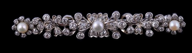 A pearl and diamond bar brooch , the floral bar with pearl and diamond clusters to the terminals,