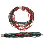 A malachite and coral multi strand necklace, composed of polished malachite and coral beads with a