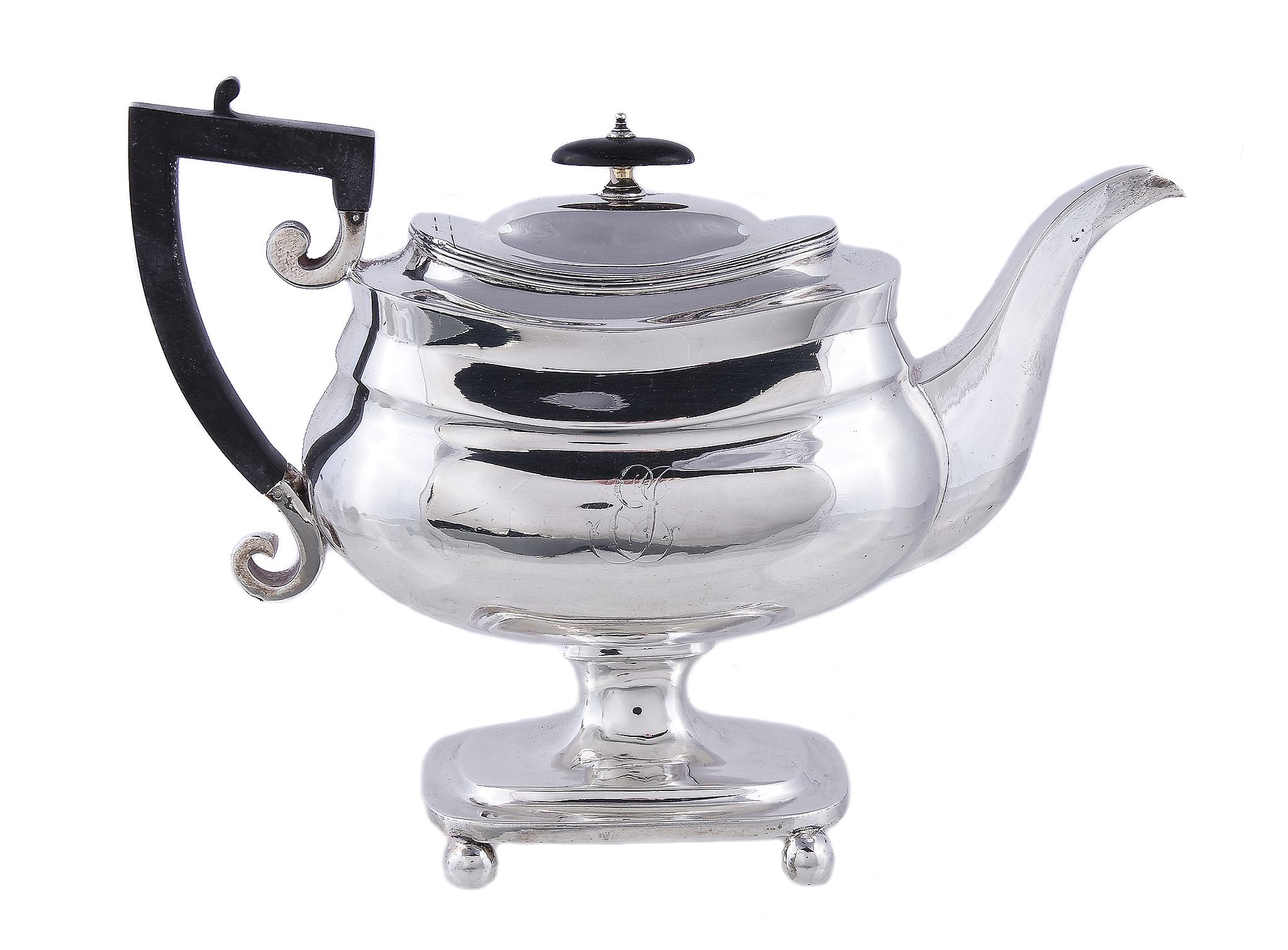 A George III oblong baluster pedestal tea pot by John Lambe, London 1789, with an ebonised finial