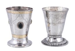 An 18th century North European silver beaker, marked SSS? in a trefoil punch, with a flared lip,