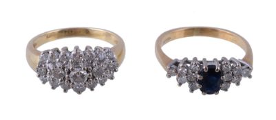 An 18 carat gold diamond ring, set with a cluster of brilliant cut diamonds, approximately 0.64