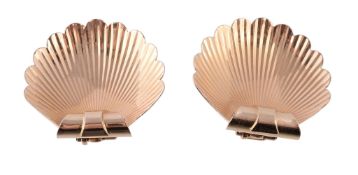 A pair of 1950s shell clip brooches, designed as scallop shells, with double prong clip fittings,