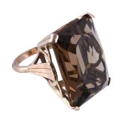 A smoky quartz ring, the rectangular cut smoky quartz in a four claw setting, stamped 9ct, finger