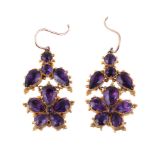 A pair of early 19th century amethyst earrings, circa 1820, designed as flower heads set with pear