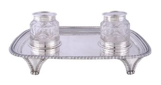 A late George III silver oblong ink stand by William Bennett, London 1813, with a raised moulded