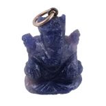 A sapphire Ganesh pendant, the sapphire carved as Ganesh, 3.4cm long including bale