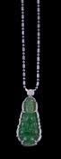 A jadeite and diamond pendant, carved with the goddess Nang Kwak, below a brilliant cut diamond